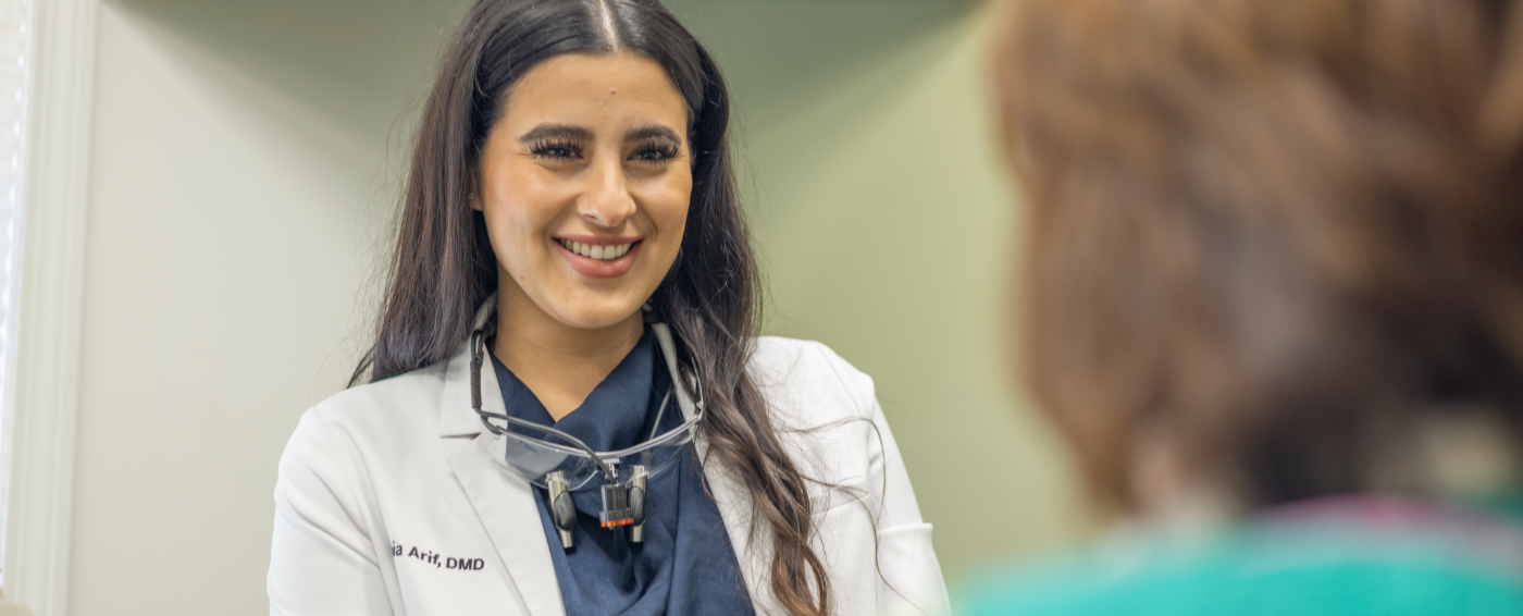 Three smiling women in North Attleboro dental office